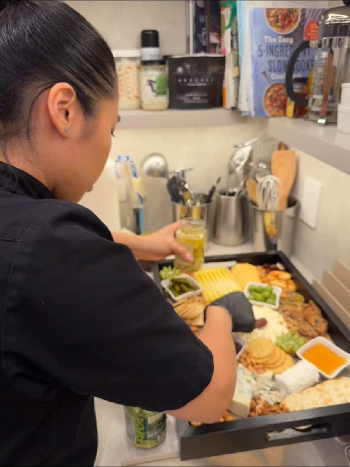 Dorothy Chao preparing food in the kitchen