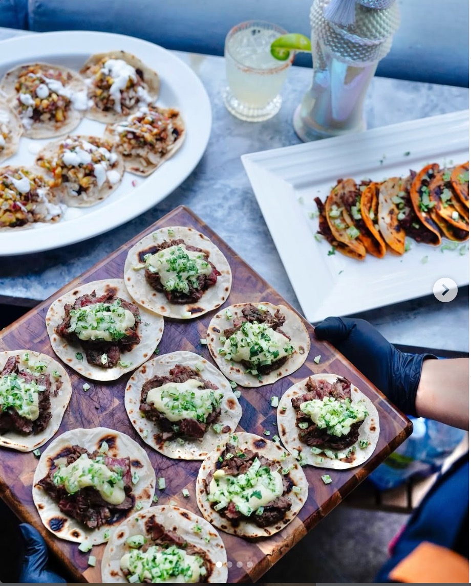 Taco spread with steak tacos and birria by Chef Dorothy